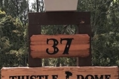 Airbnb sign THISTLE DOME (This'll Do Me) with letterbox house number. Make your property unique yet easy to find for your guests and create an immediate impression upon arrival. They will always remember when they stayed at Thistle Dome, number 37 :)