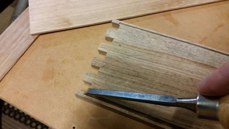 Squaring up the end of the slot with a chisel