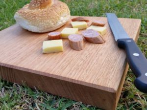 cheese board made from australian grown hardwood Victorian Ash with cheese squares, kabana and knife