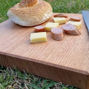 cheese board made from australian grown hardwood Victorian Ash with cheese squares, kabana and knife