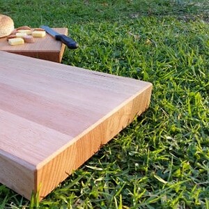 large chopping board made from victorian ash on grass