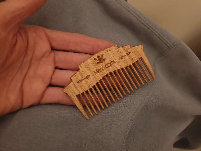 Beard Comb on cotton rag after polishing with coconut oil