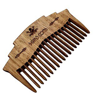 hand crafted wooden beard comb closeup image on white background