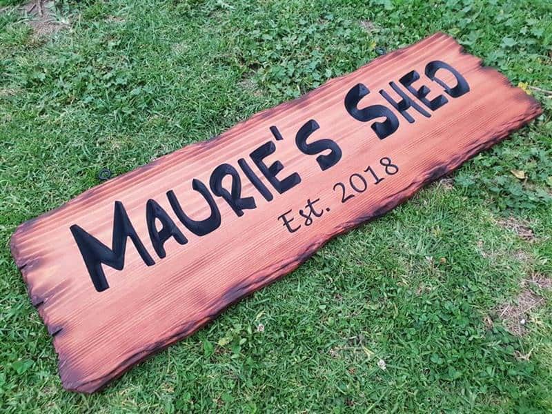 Personalised shed sign example with rustic carved edges scorched with flame