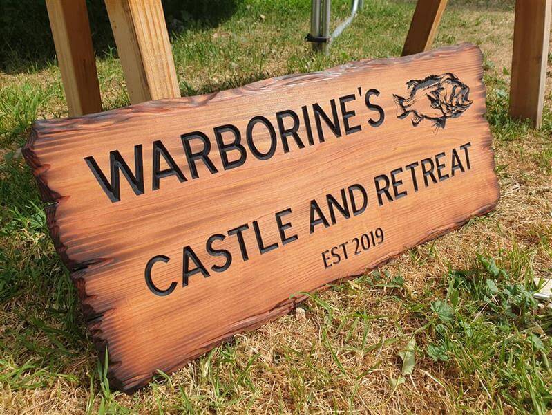 Shed sign for a fisherman's castle and retreat with engraved fish picture est 2019