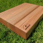 Custom Made Tasmanian Oak Chopping Board sitting on the grass in the sun