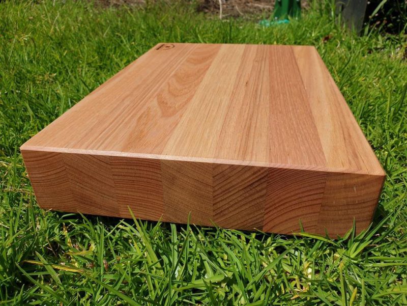 Edge photo of Tasmanian Oak chopping board on grass