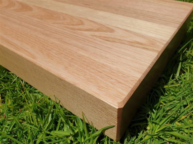 Tasmanian Oak Chopping Board corner detail on grass