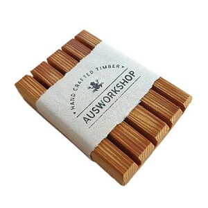 A wooden soap holder made from recycled Cedar timber with Ausworkshop label and white background