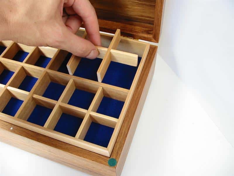 custom made cufflinks box made from Tasmanian blackwood with Tasmanian Oak removeable inserts being lifted out and blue felt lining beneath