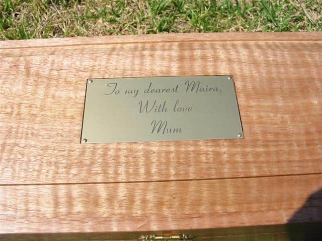 personalised laser engraved brass plaque inset into custom made box lid reading 'To my dearest Maira With love Mum'