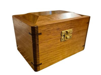wooden box custom made from tasmanian blackwood with spotted gum raised panel lid and brass catch